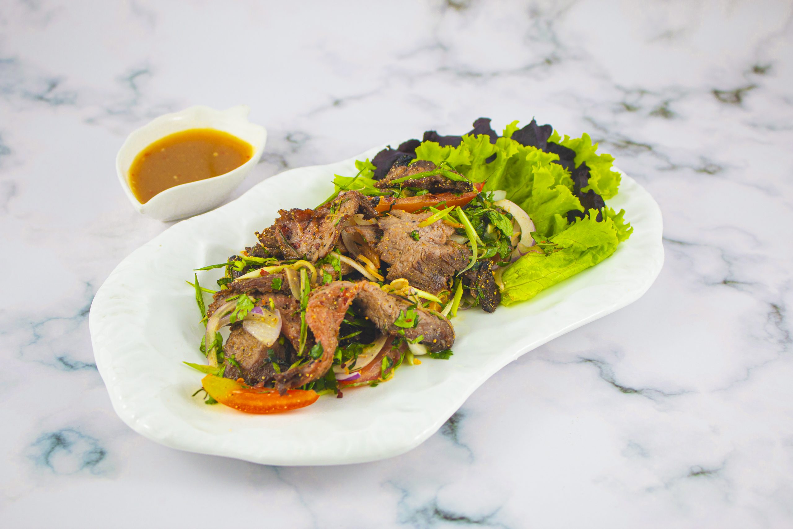 North-Eastern Thai Style Grilled Beef Salad from takeaway menu of Manilahouse